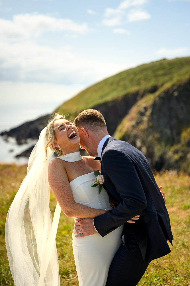 Candid wedding couple portrait at Ballycotton Cliff Walk